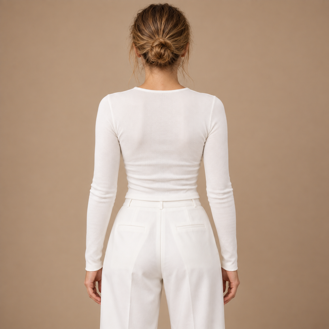Langærmet croptop til dame i ribstrik